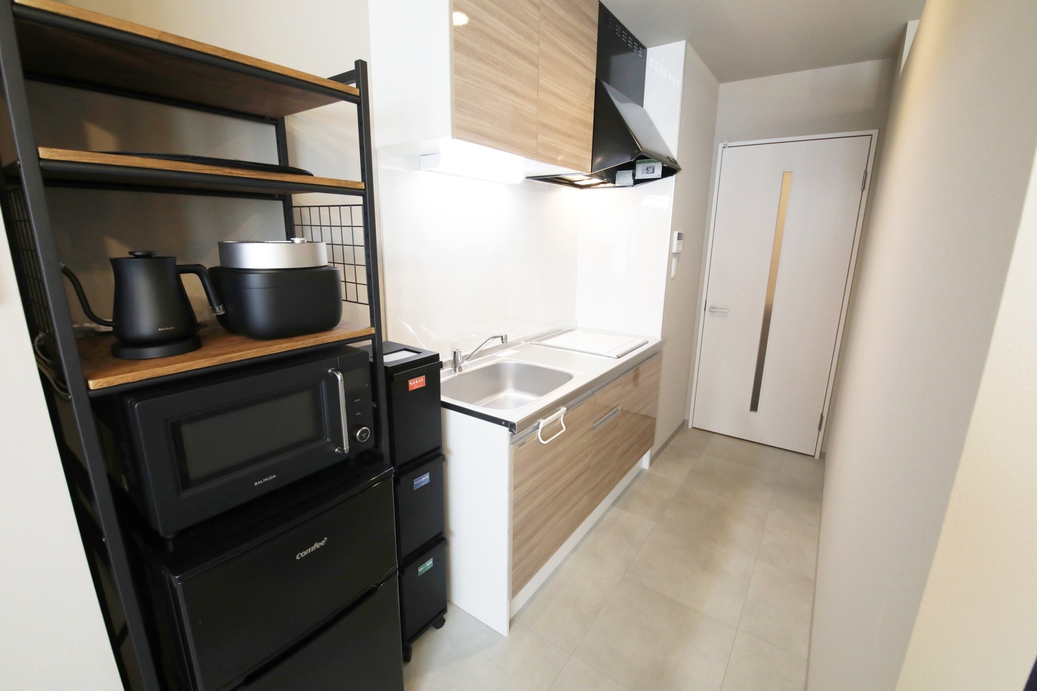 Room 101 kitchen with IH hob and appliance shelf